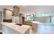 Modern kitchen featuring stainless steel appliances and an island with a cooktop at 1477 Triple Creek Nw Ct, Kennesaw, GA 30144