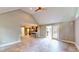 Bright living room with vaulted ceilings and easy access to the kitchen and outdoor deck at 1477 Triple Creek Nw Ct, Kennesaw, GA 30144