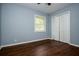 Cozy bedroom with hardwood floors, neutral wall color, and ample natural light at 3372 Ward Drive Southwest Sw Dr, Atlanta, GA 30354