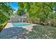 Enjoy the pool and deck that is nestled in a serene, private backyard surrounded by trees at 3544 Chestatee Dr, Marietta, GA 30062