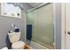 A bathroom featuring a toilet and shower, offering essential amenities at 3544 Chestatee Dr, Marietta, GA 30062