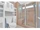 Well-lit bathroom features a glass shower, white cabinetry, and updated fixtures at 3544 Chestatee Dr, Marietta, GA 30062