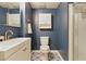 Nicely appointed bathroom features a sink, toilet, and shower with a tiled floor at 3544 Chestatee Dr, Marietta, GA 30062