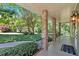 Relaxing covered porch offering scenic views of lush greenery at 3544 Chestatee Dr, Marietta, GA 30062