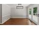A dining area features a modern light fixture and French doors at 3544 Chestatee Dr, Marietta, GA 30062