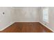 Bright dining room with hardwood floors and ample natural light at 3544 Chestatee Dr, Marietta, GA 30062