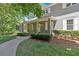 Inviting front entrance with covered porch and brick accents at 3544 Chestatee Dr, Marietta, GA 30062