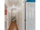 A bright hallway with hardwood floors, neutral paint, and white trim at 3544 Chestatee Dr, Marietta, GA 30062