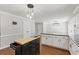 Open kitchen view showcases the island, plentiful cabinets, and leads to the dining area at 3544 Chestatee Dr, Marietta, GA 30062