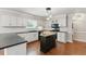 Bright kitchen features white cabinets, dark countertops, an island, and stainless steel appliances at 3544 Chestatee Dr, Marietta, GA 30062