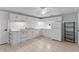 This cozy kitchen is complete with white cabinetry and appliances, providing everything you need at 3544 Chestatee Dr, Marietta, GA 30062