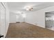 Spacious living room with updated carpet and neutral-toned walls offers great natural lighting at 3544 Chestatee Dr, Marietta, GA 30062