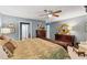 Spacious bedroom with a calm paint color, warm lighting, and furniture sets at 3544 Chestatee Dr, Marietta, GA 30062