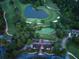 An aerial image showcases a community center adjacent to the golf course and surrounding greenspace at 3642 Fowler Rdg, Douglasville, GA 30135