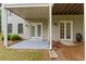 Exterior showing backyard patio with access doors at 3642 Fowler Rdg, Douglasville, GA 30135