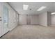 Finished basement featuring neutral walls, recessed lights, and an exit door at 3642 Fowler Rdg, Douglasville, GA 30135