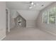 Attic bedroom with dormer window and carpeting at 3642 Fowler Rdg, Douglasville, GA 30135
