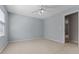 Neutral bedroom with a ceiling fan at 3642 Fowler Rdg, Douglasville, GA 30135