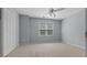 Bedroom offering neutral walls, carpet floors, double door closet, and natural light at 3642 Fowler Rdg, Douglasville, GA 30135