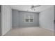 Bedroom with light-blue walls, carpet, and double door closet at 3642 Fowler Rdg, Douglasville, GA 30135