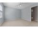 Bedroom featuring neutral walls, carpet floors, and a ceiling fan at 3642 Fowler Rdg, Douglasville, GA 30135