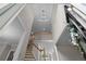 Grand two-story foyer with a decorative chandelier and staircase at 3642 Fowler Rdg, Douglasville, GA 30135