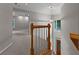 Spacious foyer featuring hardwood banister, and an elegant chandelier at 3642 Fowler Rdg, Douglasville, GA 30135