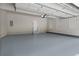 Spacious garage with painted floor and ample storage at 3642 Fowler Rdg, Douglasville, GA 30135