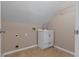 Laundry room with tile floors, white cabinets, and a sink at 3642 Fowler Rdg, Douglasville, GA 30135