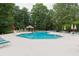 Community swimming pool with ample lounge seating, a gazebo, and well-maintained surroundings at 3642 Fowler Rdg, Douglasville, GA 30135