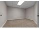 Neutral room with tan carpet and white trim at 3642 Fowler Rdg, Douglasville, GA 30135