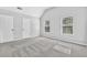 Bright bedroom features two windows for ample natural light and a spacious layout at 4238 Sir Dixon Dr, Fairburn, GA 30213