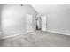 Spacious bedroom features neutral paint and carpeting, two entry doors, and a bright, open feel at 4238 Sir Dixon Dr, Fairburn, GA 30213