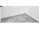 Cozy room with gray carpeting, white walls, and white baseboards for a clean, modern look at 4238 Sir Dixon Dr, Fairburn, GA 30213