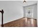 Bright entryway showcasing hardwood floors and a front door with glass detailing leading outside at 4238 Sir Dixon Dr, Fairburn, GA 30213