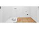 The laundry room offers tile flooring, utility hookups and is ready for appliances at 4238 Sir Dixon Dr, Fairburn, GA 30213