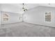 Spacious main bedroom featuring vaulted ceiling, fan, and an abundance of natural light at 4238 Sir Dixon Dr, Fairburn, GA 30213