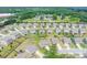 Aerial view of a neighborhood and a home that is near shopping and schools at 431 Hinton Farm Way, Dacula, GA 30019