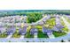 Aerial view of a home in Dacula, GA, surrounded by lush trees and neighboring houses at 431 Hinton Farm Way, Dacula, GA 30019