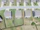 Aerial view of a backyard, bordered by fencing, and the neighboring homes behind it at 431 Hinton Farm Way, Dacula, GA 30019