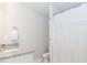 Clean bathroom with granite counters, a shower with a curtain, and modern fixtures at 431 Hinton Farm Way, Dacula, GA 30019