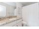 Clean bathroom featuring granite countertops, white cabinets, and a shower with a curtain at 431 Hinton Farm Way, Dacula, GA 30019