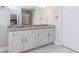 Bathroom featuring granite countertops and double sinks, providing ample space and style at 431 Hinton Farm Way, Dacula, GA 30019