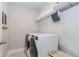 Functional laundry room featuring a washer, dryer, and plenty of storage space at 431 Hinton Farm Way, Dacula, GA 30019