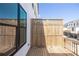 Exterior view of a new back deck with wood privacy screen at 502 Healy Dr # 76, Cumming, GA 30040
