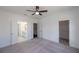 A bedroom offers an ensuite bathroom with double doors and a walk-in closet for ample storage at 502 Healy Dr # 76, Cumming, GA 30040