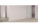 Bright bedroom with carpet and access to a bathroom and other rooms at 637 Kimberwick Dr, Locust Grove, GA 30248