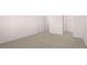 Spacious bedroom showcasing plush carpet, a closet, and doorway at 637 Kimberwick Dr, Locust Grove, GA 30248
