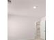 This bedroom features neutral walls and a walk-in closet at 637 Kimberwick Dr, Locust Grove, GA 30248