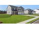 Beautiful two-story home featuring a well-maintained lawn and an attached two car garage at 637 Kimberwick Dr, Locust Grove, GA 30248